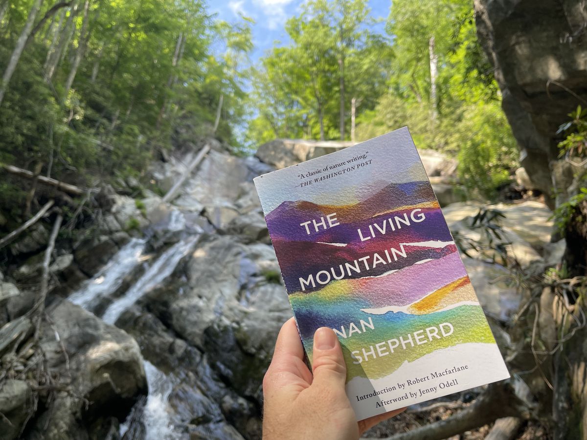 Photo of Nan Shepherd's The Living Mountain out on a hike